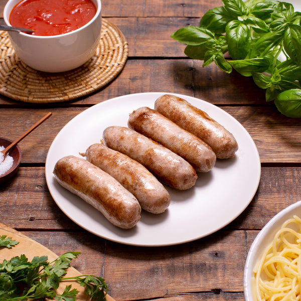 Cooked sausages in a plate.