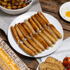 Breakfast Sausage in a plate with egg, toast and  Potato skillet on the side.